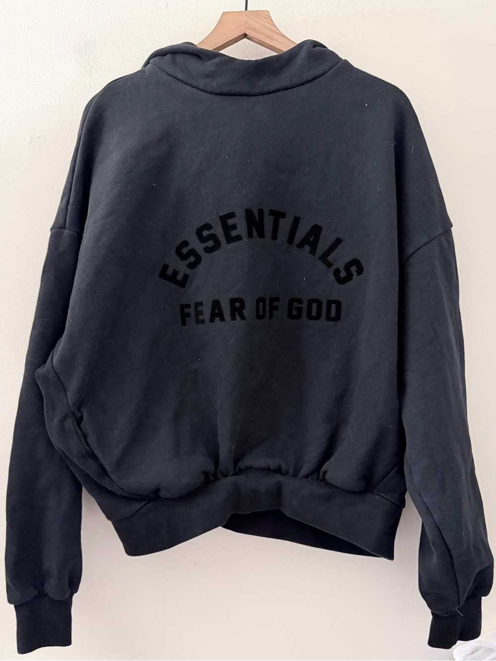 Fear of God Essentials Arch Logo Hoodie Jet Black